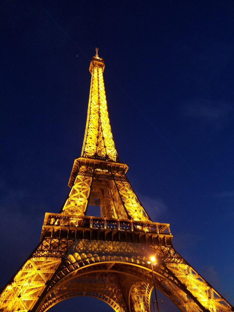 Eiffel Tower in Paris lit up at night