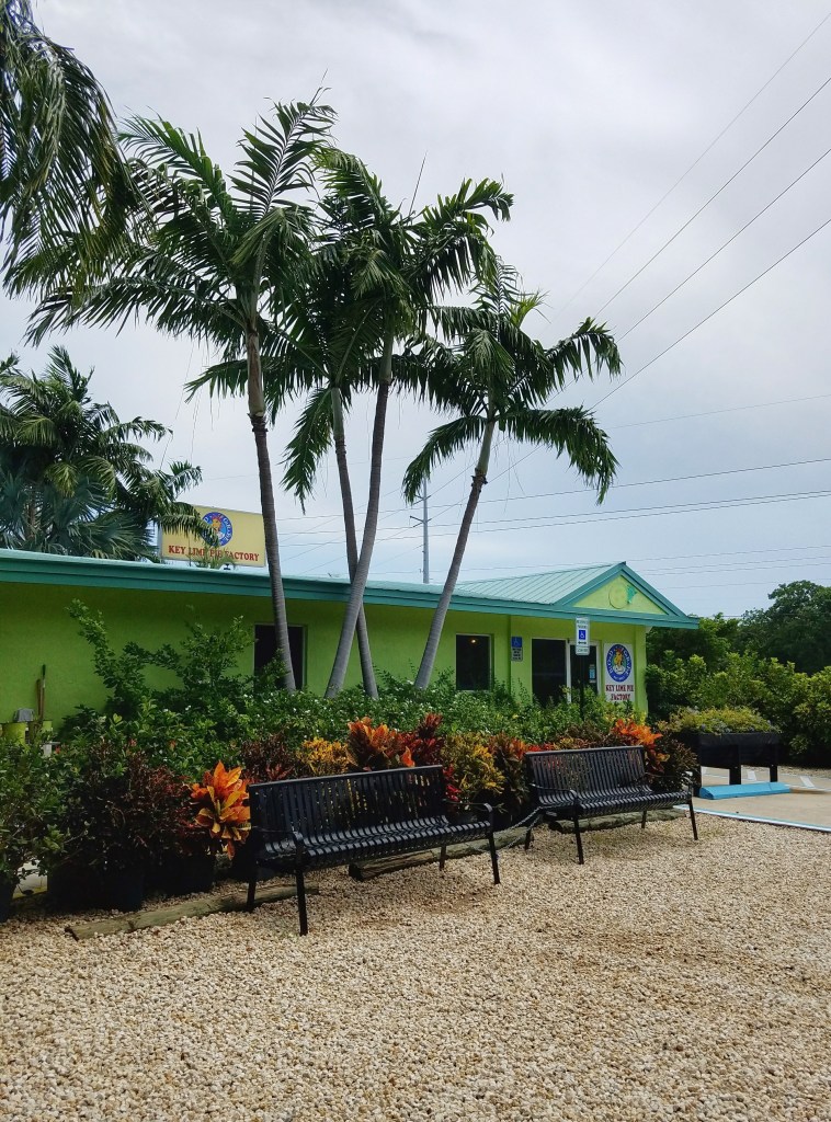 Green exterior of Blonde Giraffe Key Lime Pie Factory in Tavernier Florida Keys