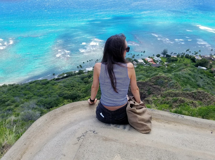 Woman sitting at the edge of a pillbox in Hawaii