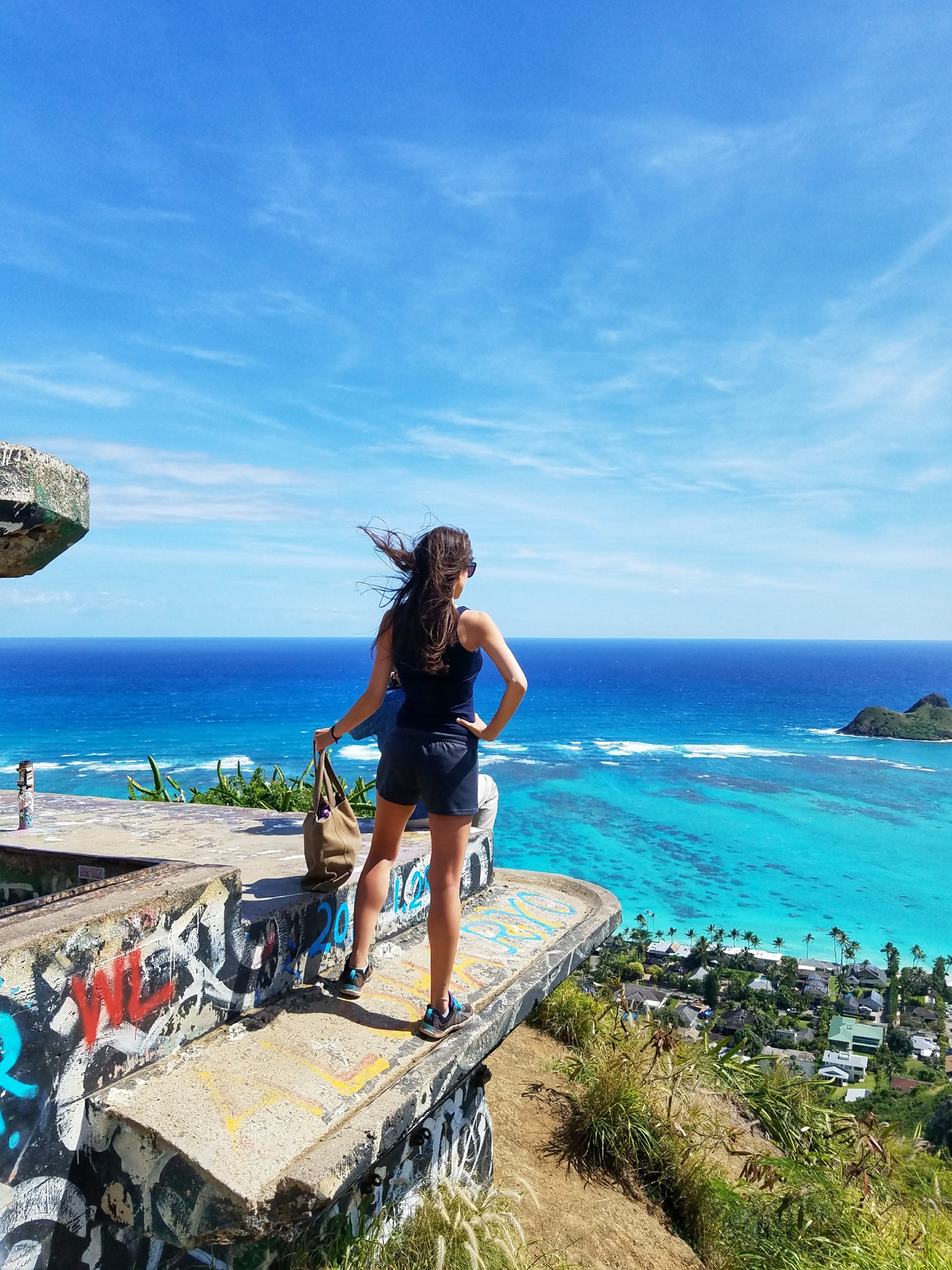 Woman standing on an abandoned fort in Hawaii