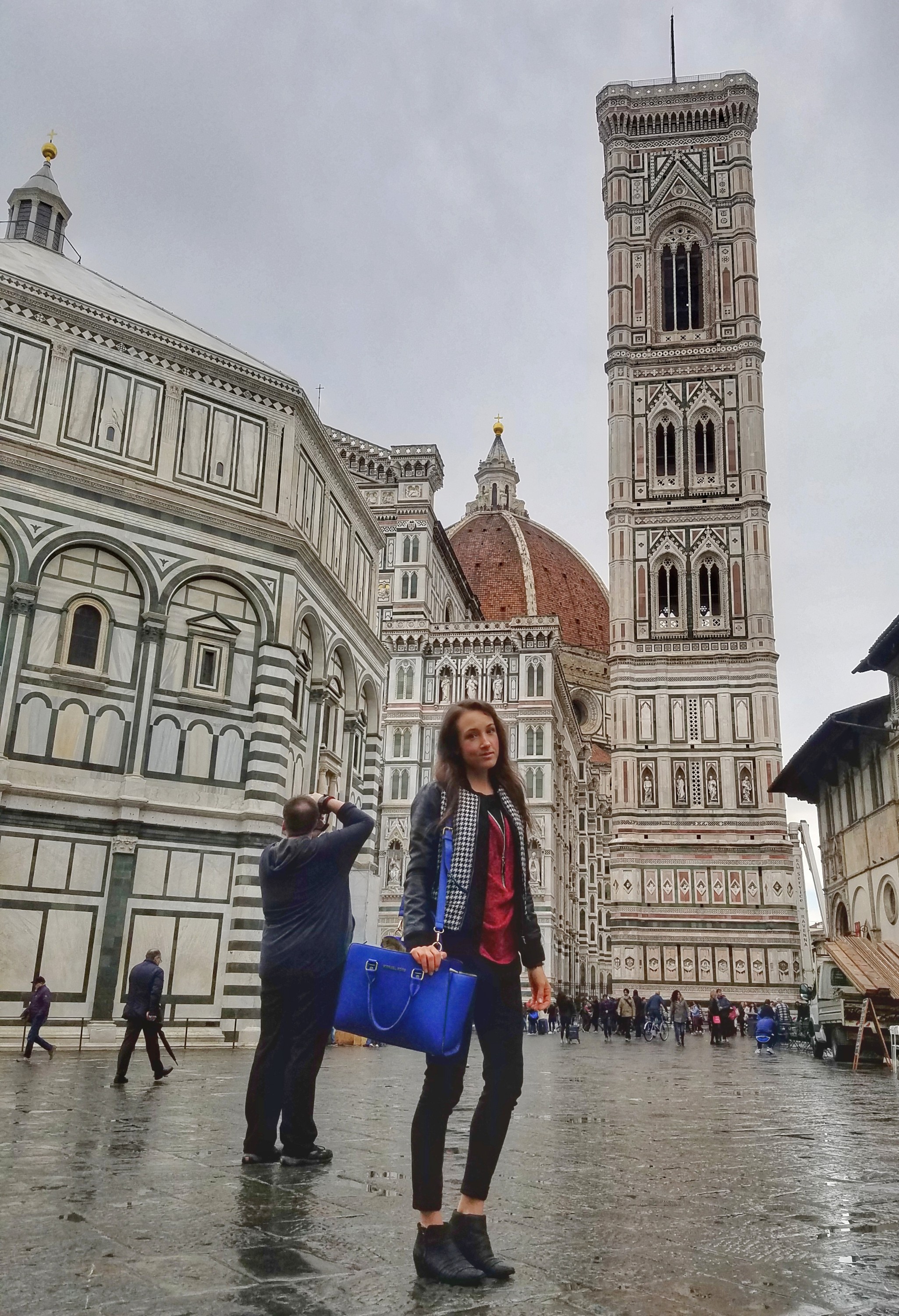 Woman posing in front of the Duomo in Florence Italy