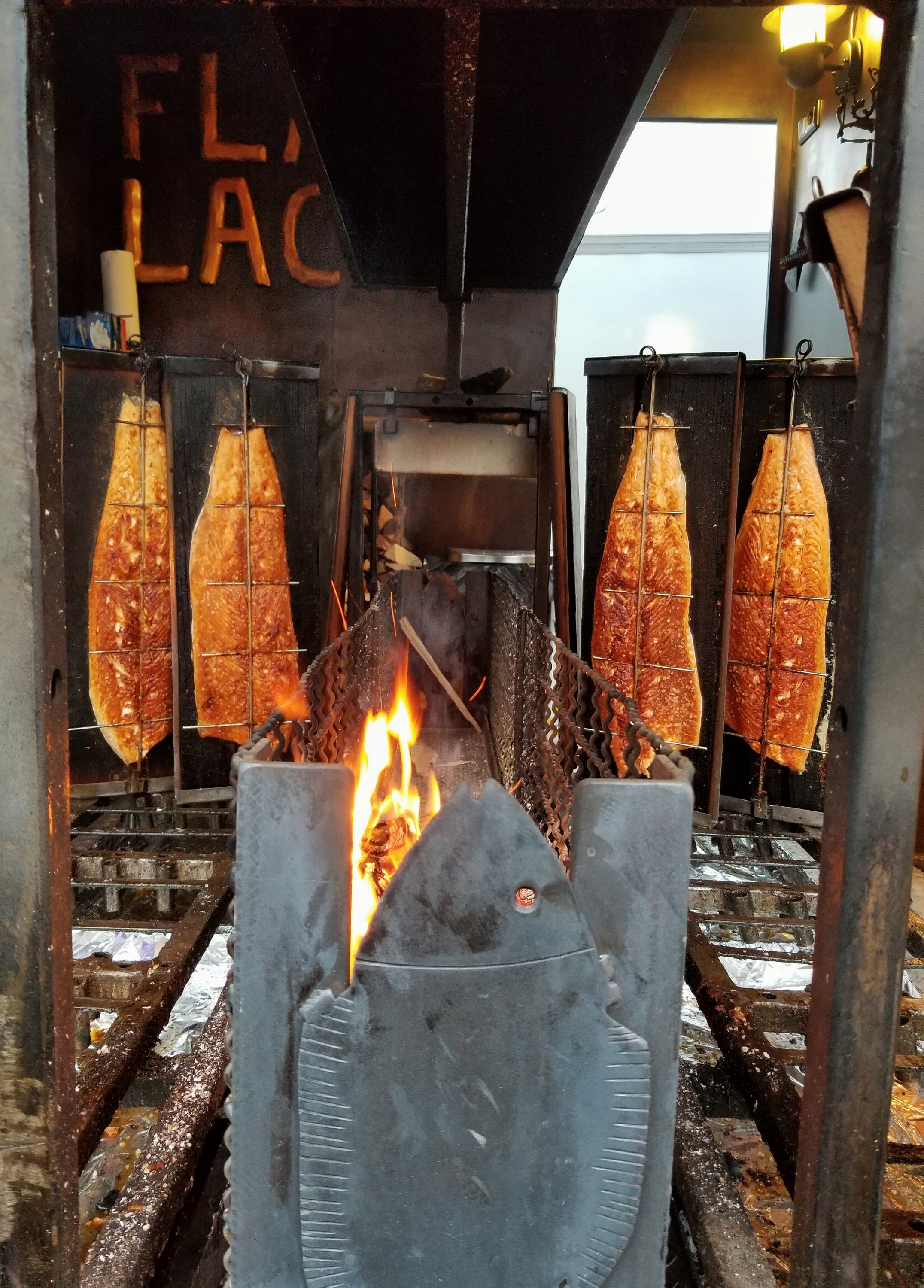 Smoked salmon hanging at a Christmas market