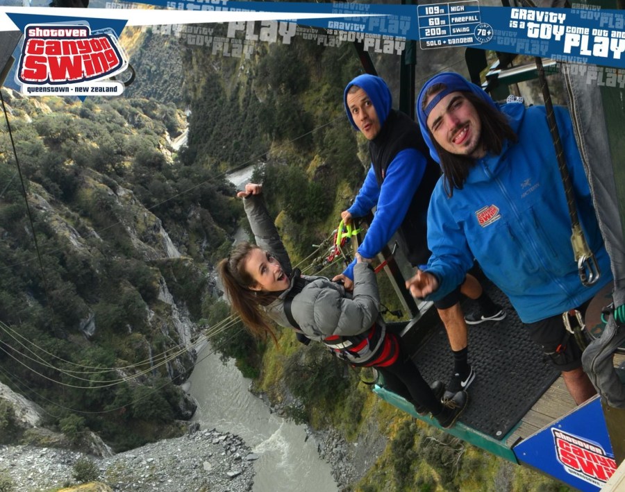 Woman about to do a canyon swing in New Zealand
