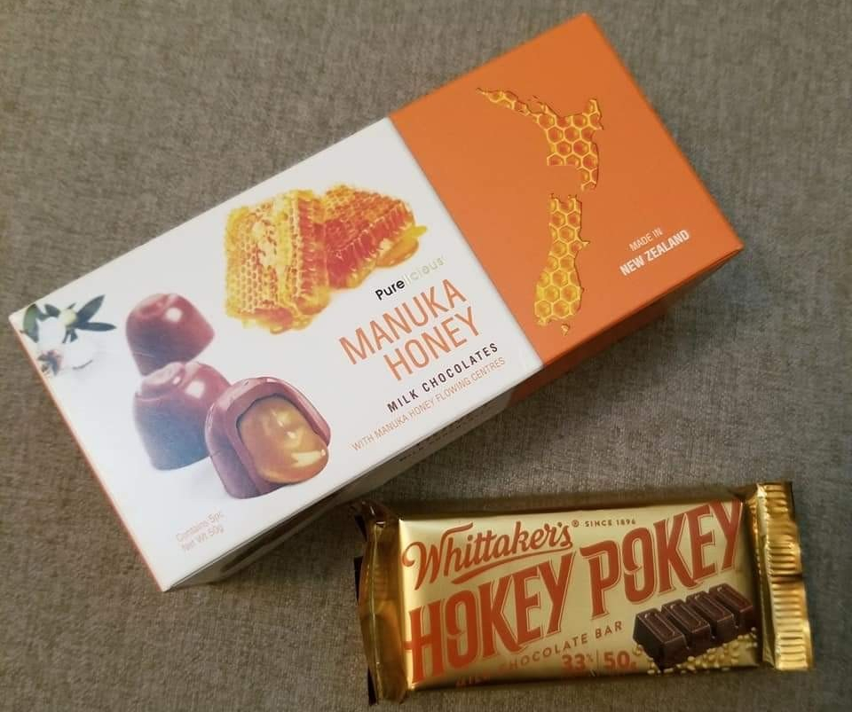 Box of pure Manuka honey milk chocolates and Whittaker's Hokey Pokey chocolate bar