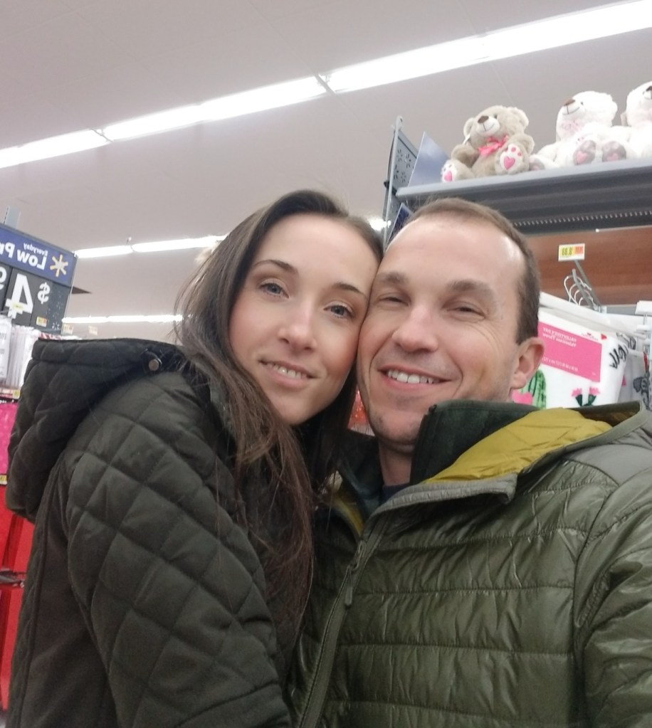 Woman and man hugging in Walmart
