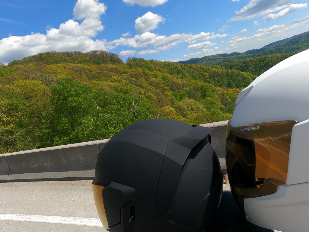 Cherohala Skyway couple on motorcycle with mountain view