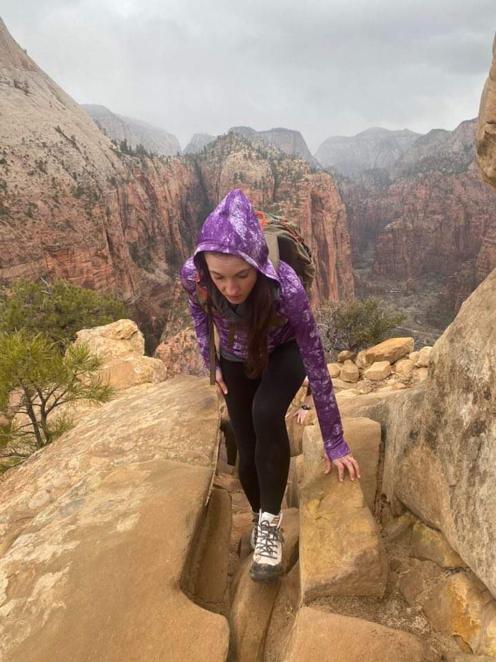 Hiker ascending Angels Landing Zion National Park 