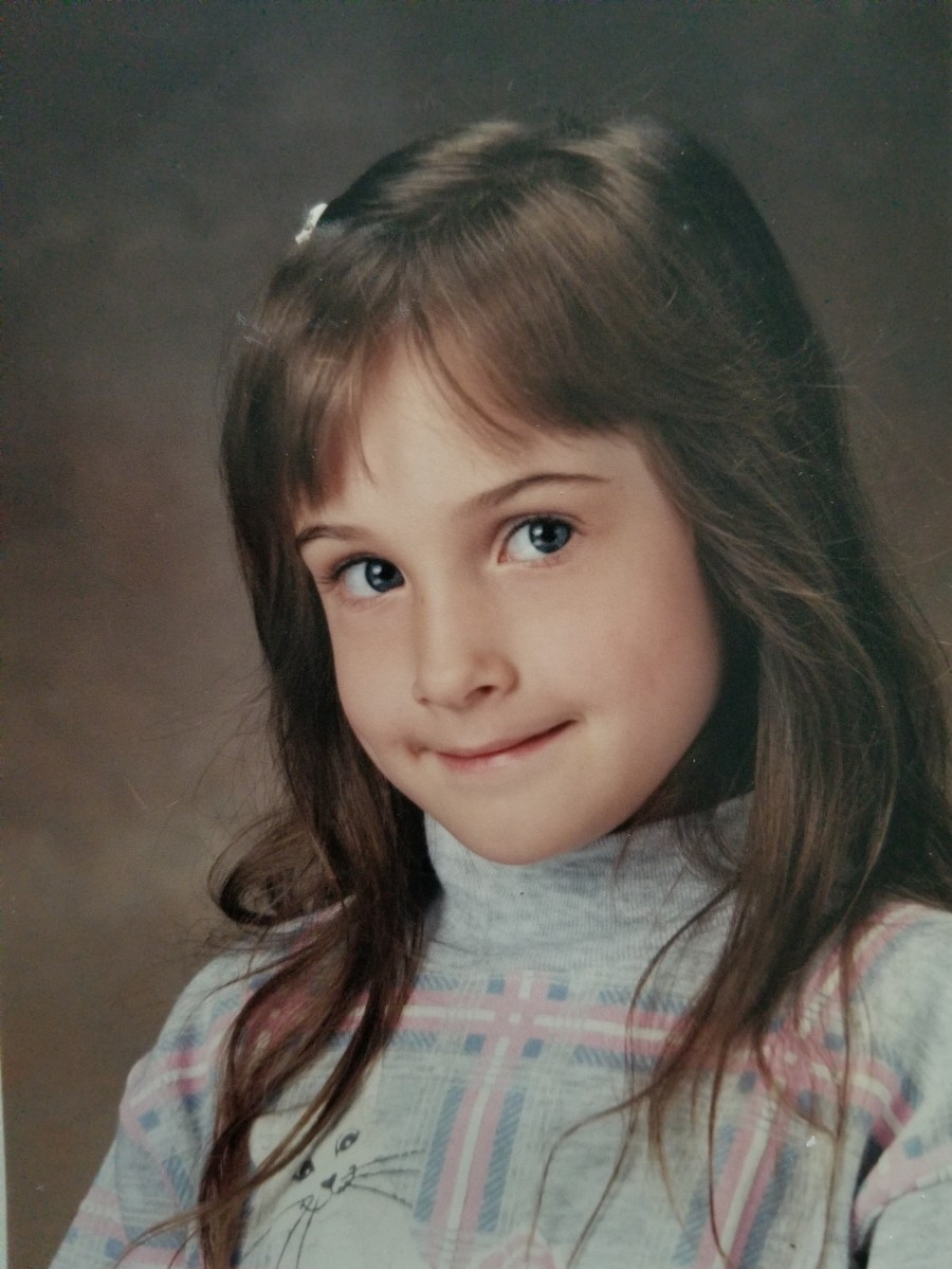 Little girl posing for a school photo