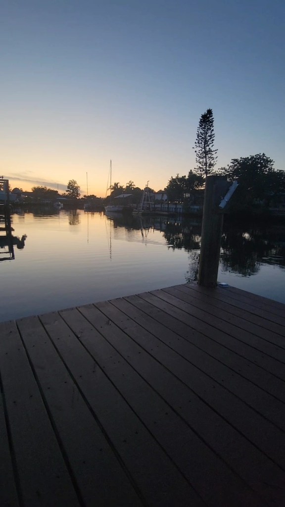 Canal at sunset with a ripple in the water
