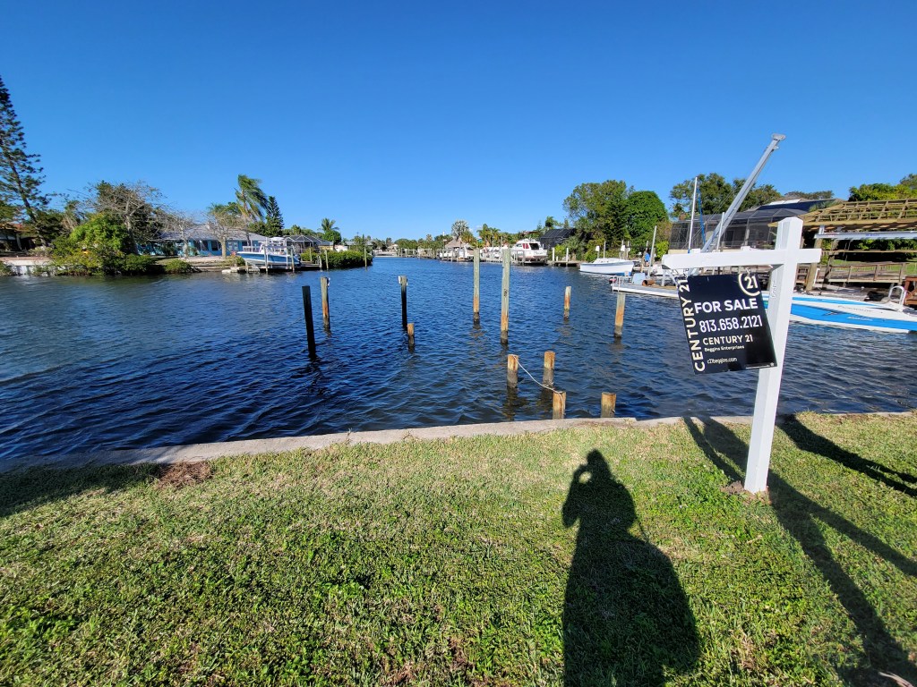 Canal with pylons from old dock