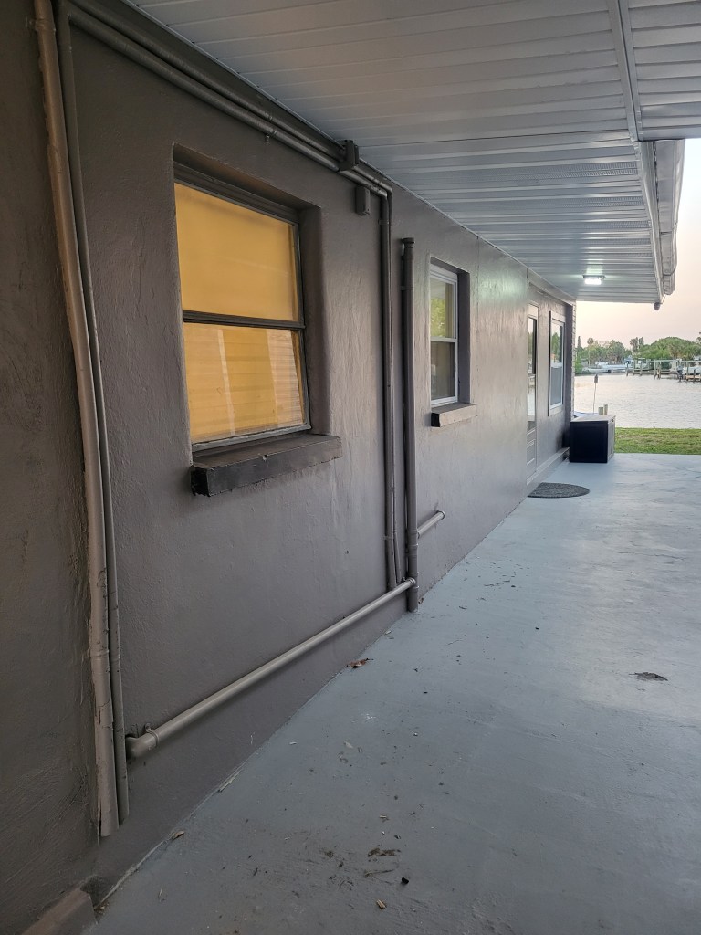 Exterior of a house with pipes exposed