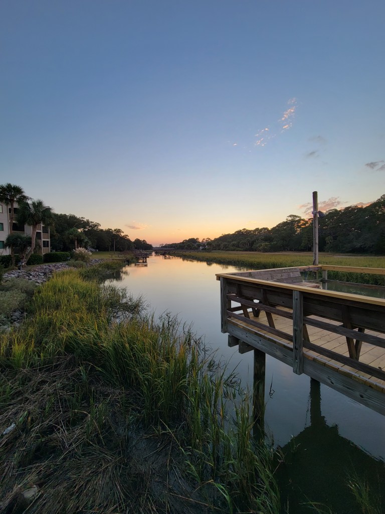 Dock in the marsh at sunset on Fripp Island, South Carolina