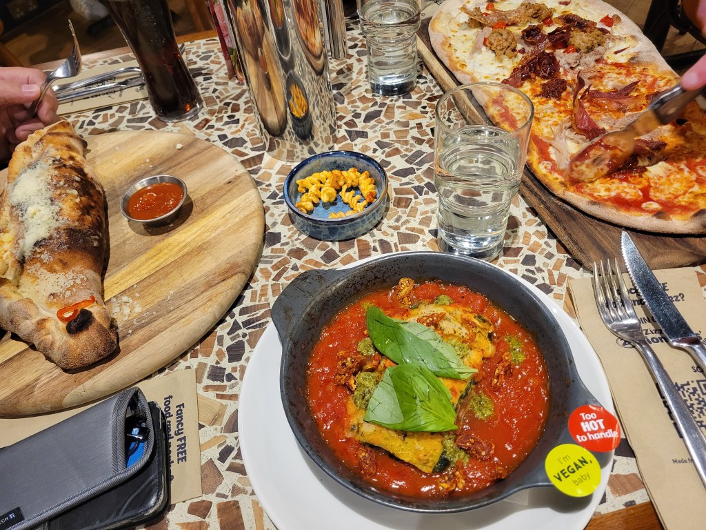 Plates of Italian food on a table