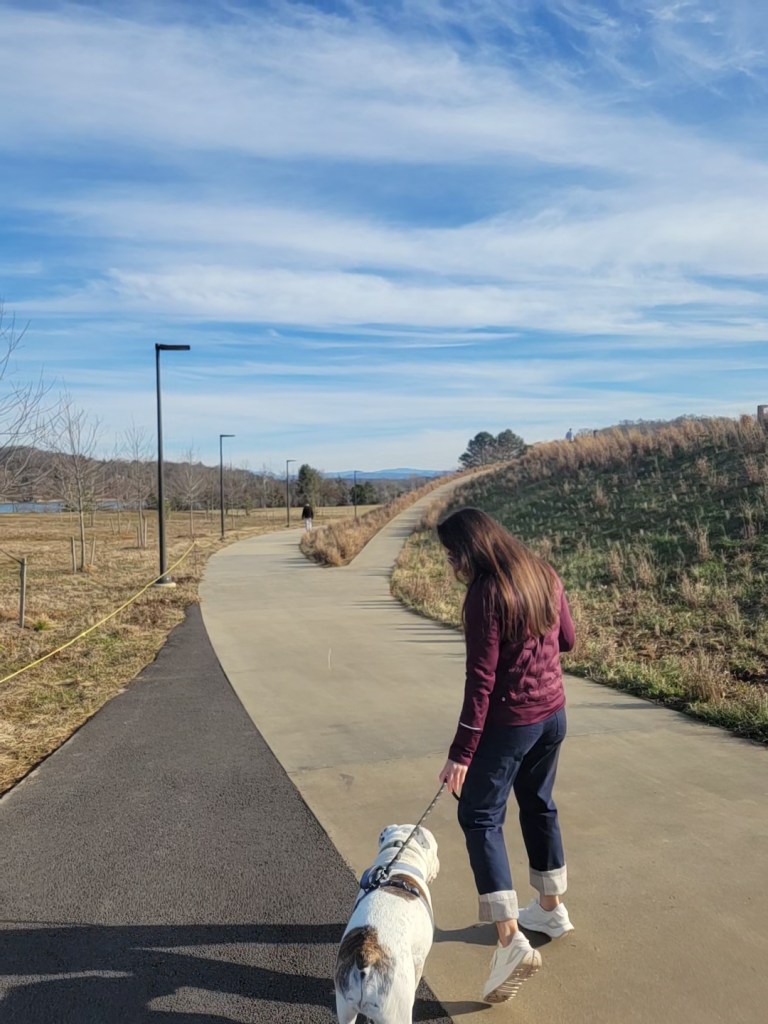 Woman and dog at a park