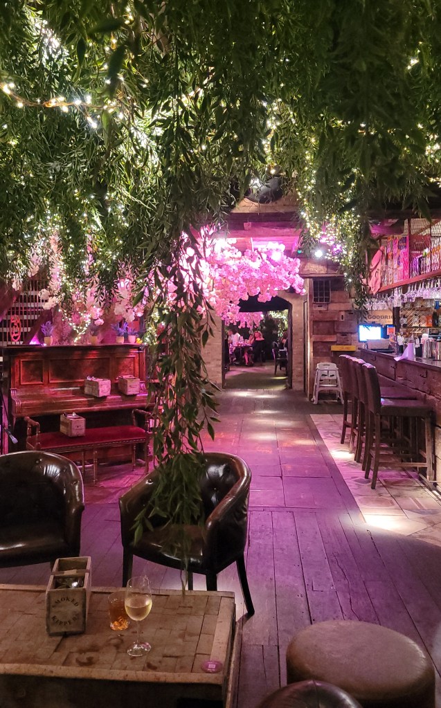 British pub decorated with lights and greenery