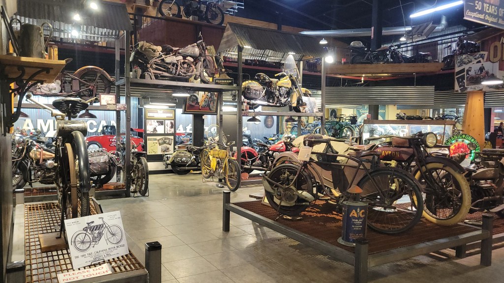 Collection of old motorcycles in a museum