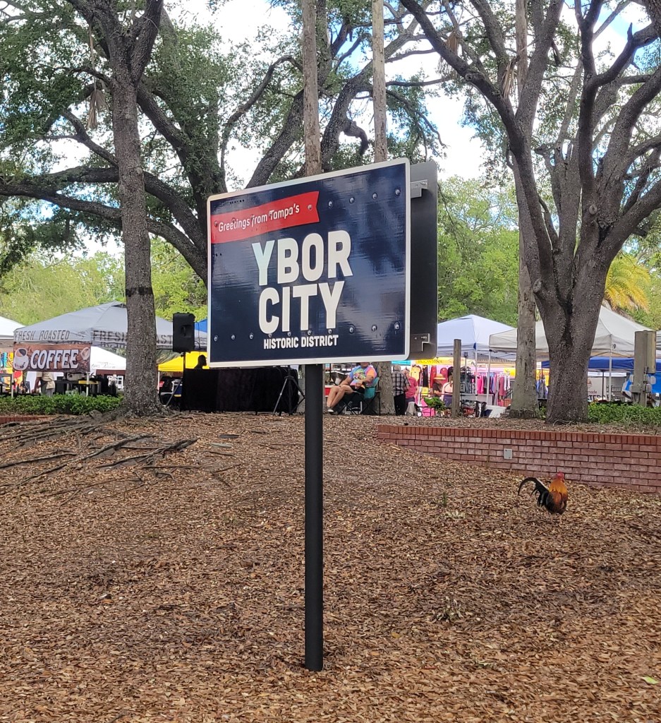 Ybor City sign in front of the Saturday Market tents
