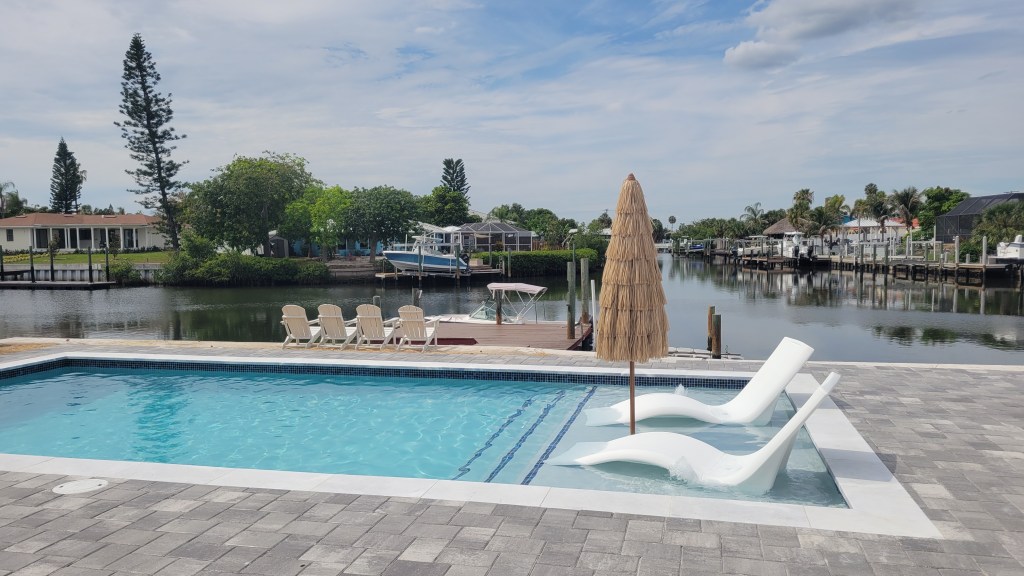 Backyard pool on a canal