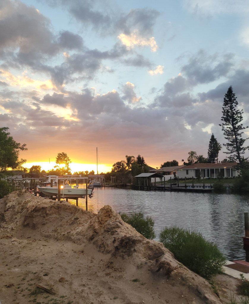 Dirt pile next to a canal in Florida 