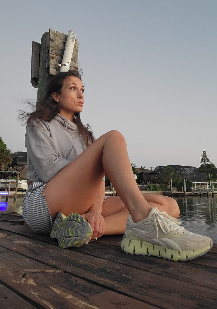 Woman sitting on a dock