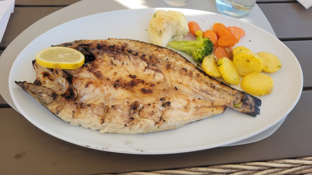 Grilled whole fish with vegetables