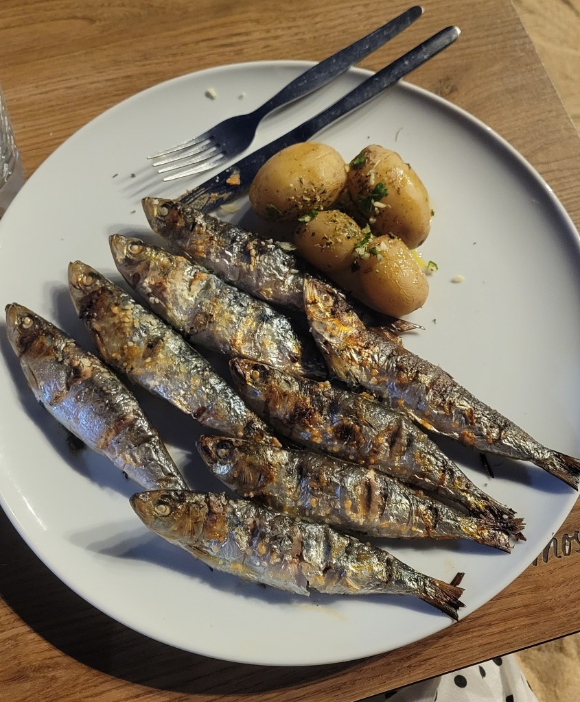 Grilled sardines on a plate
